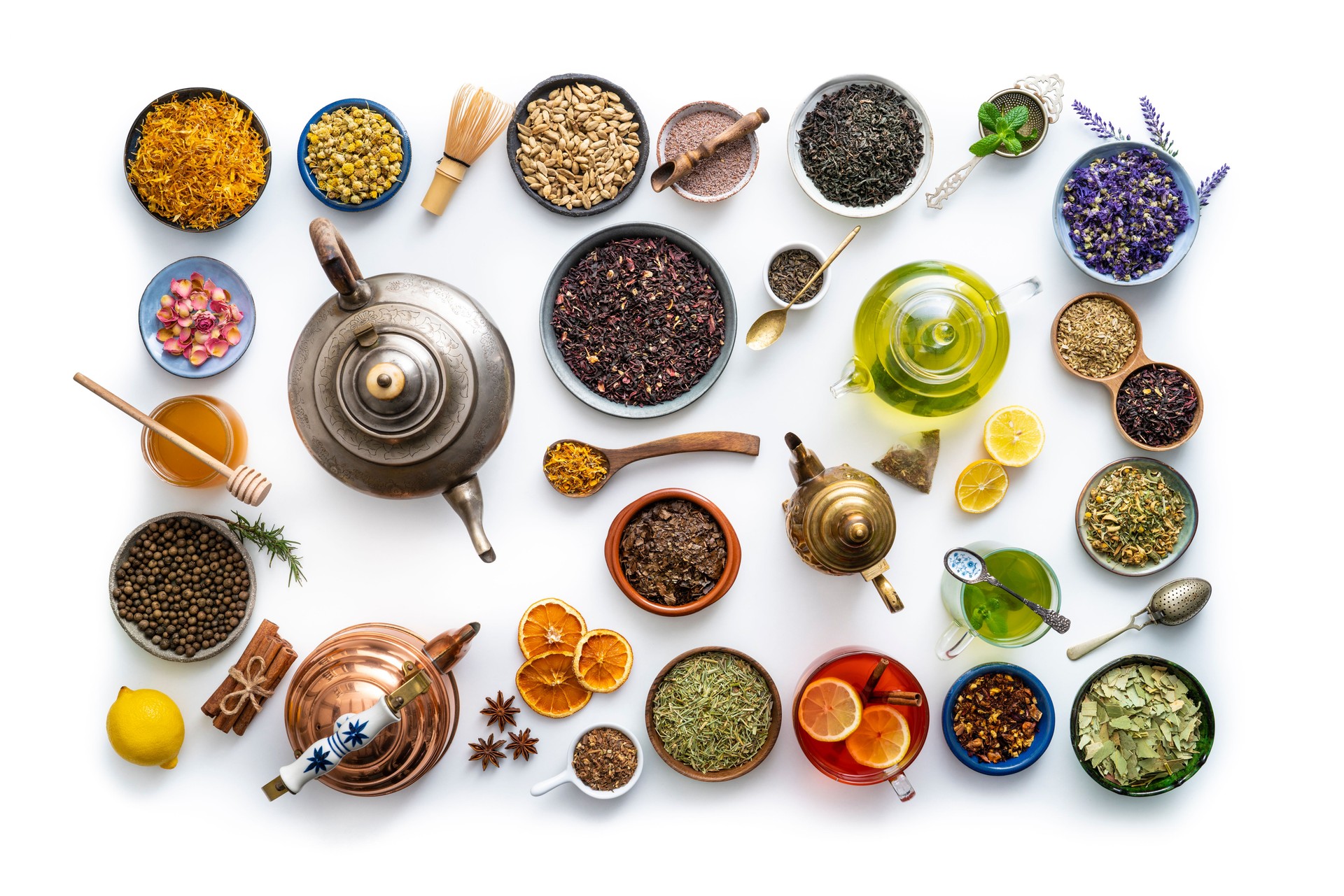 Tea and herbal infusion with dried herbs isolated on white background