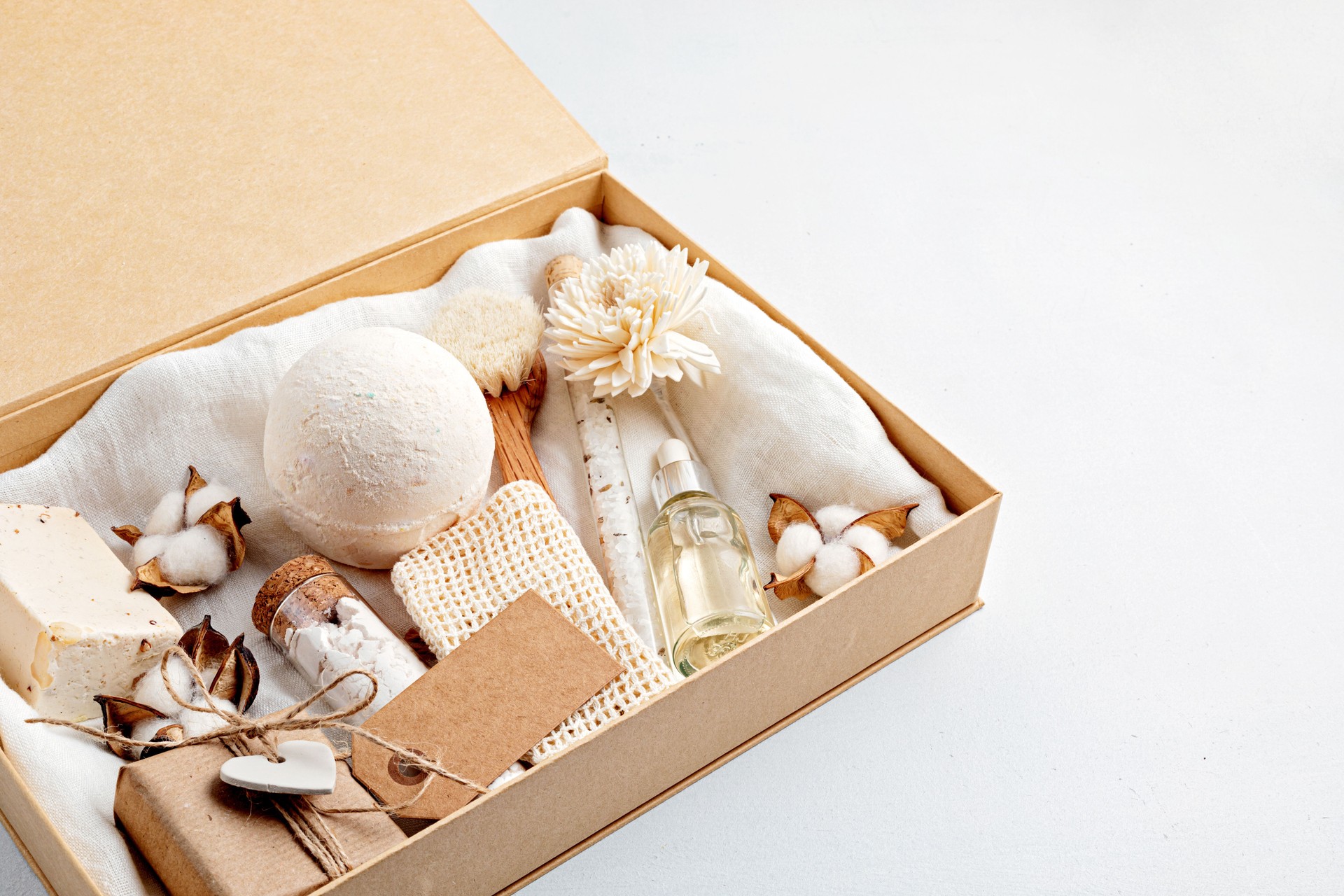 Preparing self care package, seasonal gift box with plastic free zero waste cosmetics products